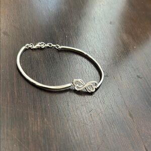 Elegant Silver Infinity Bracelet with Crystal Accents
